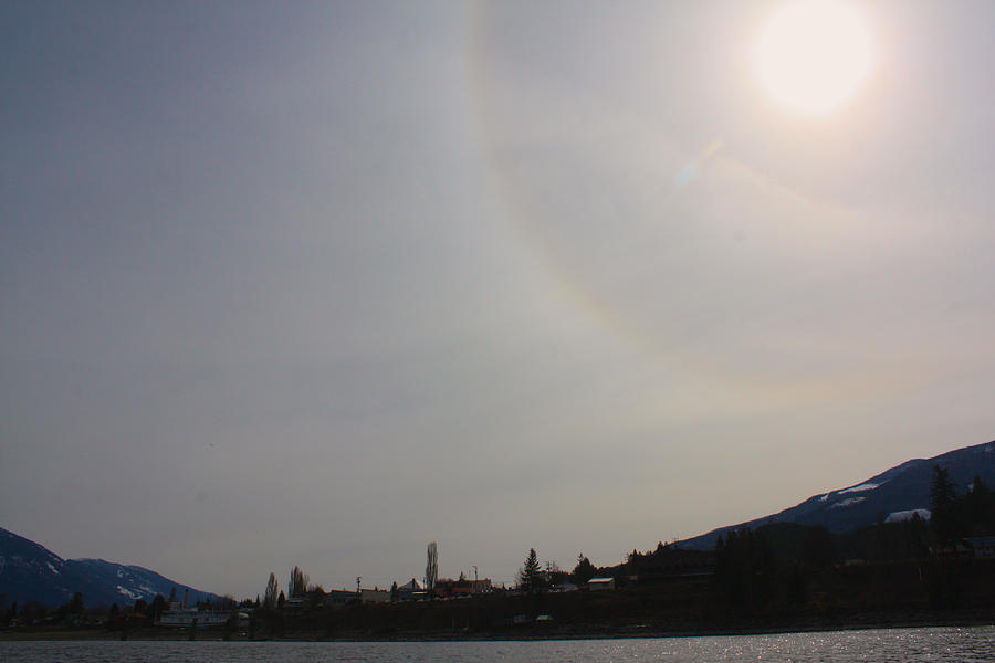 Sun Dog Over Town Photograph by Cathie Douglas