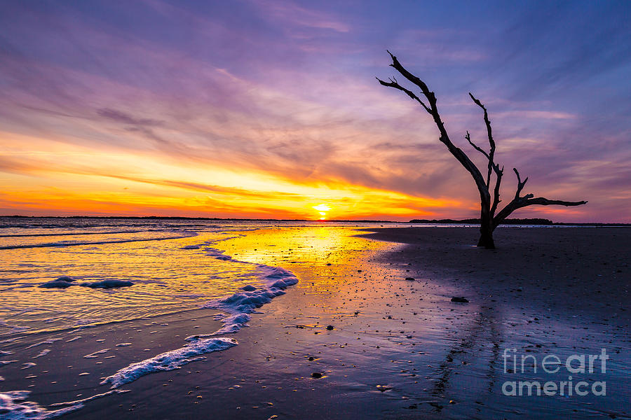 Sun drops behind Bird Key - Folly Beach SC Photograph by Donnie Whitaker