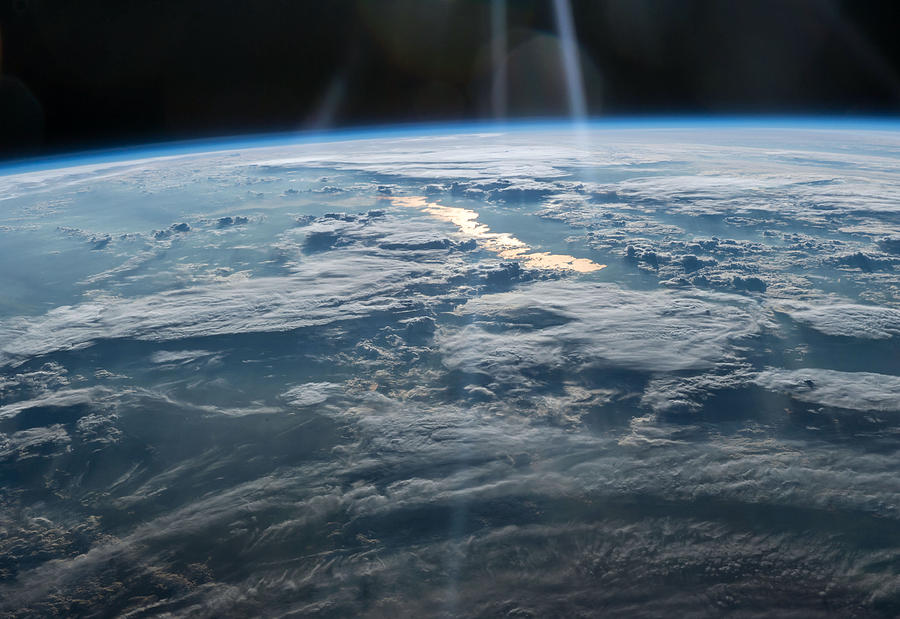 Sun Glint From The International Space Photograph by Science Source