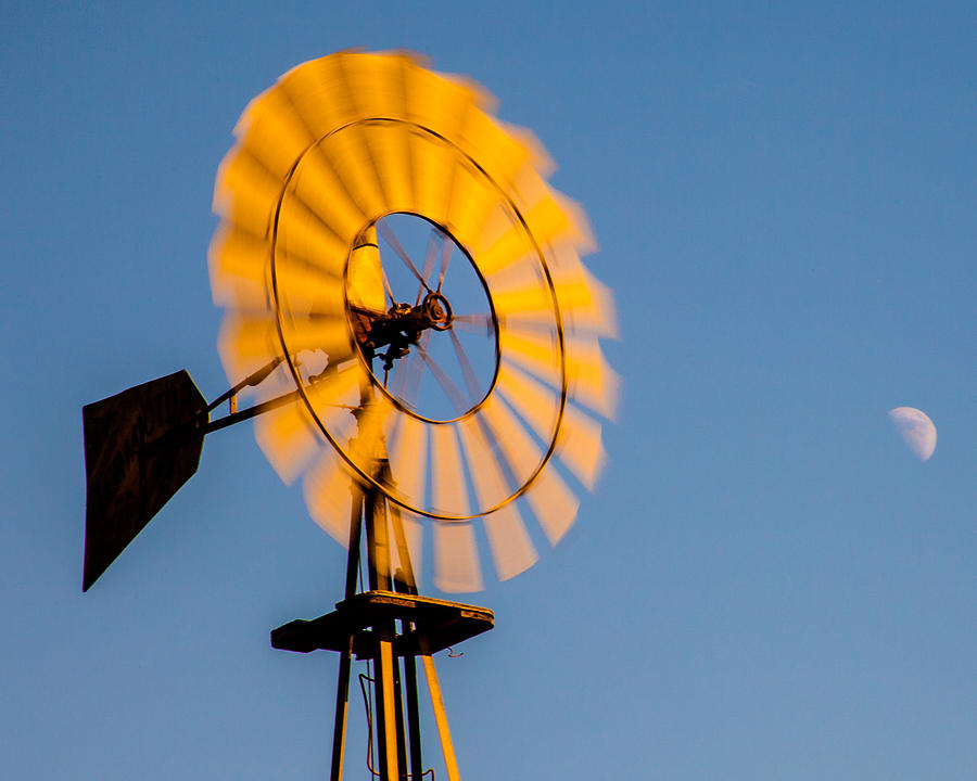 Sun On Windmill With The Moon In Blue Sky Fine Art Photography Print Photograph by Jerry Cowart