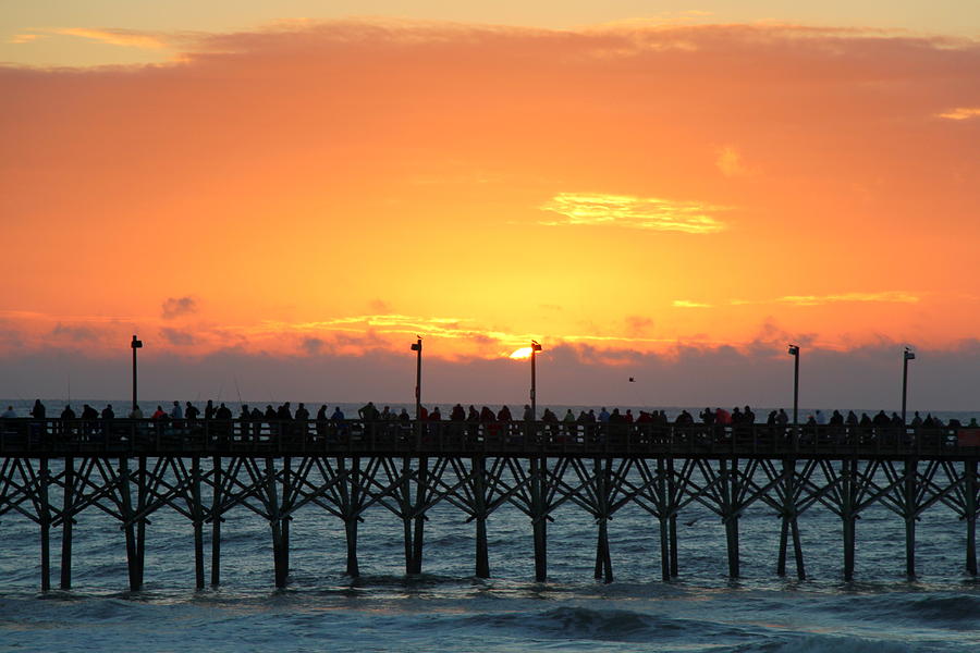 Pier Photograph - Sun in clouds over pier by Rand Wall