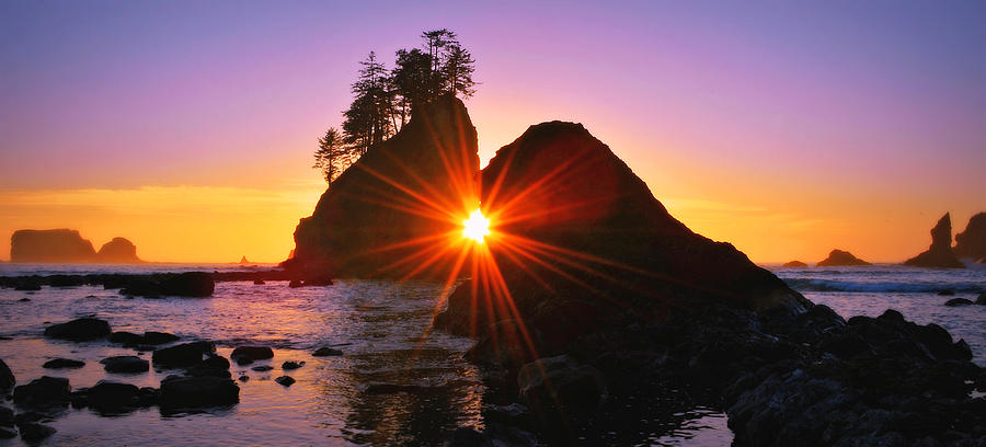 Sun Rays and Sea Stacks Photograph by Jeff Cook