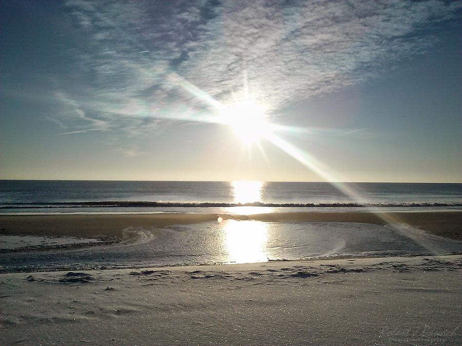 Sun Reflecting Off Ice and Ocean Photograph by Robert Banach