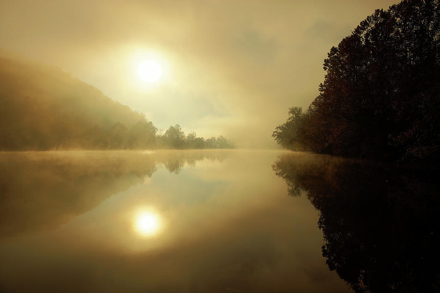 Sun Rising Through A Misty James River Photograph by Denistangneyjr