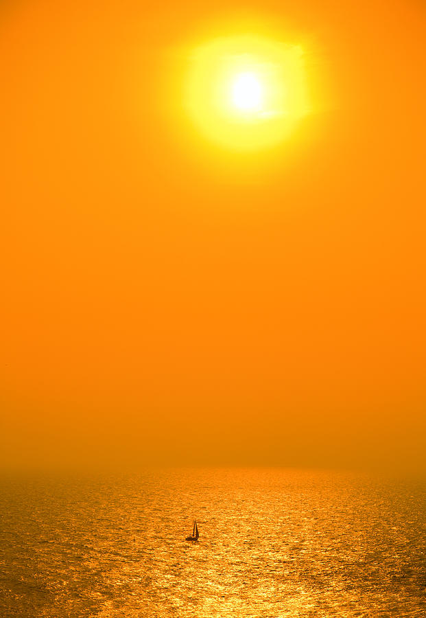 Sun sailing Photograph by Alexey Stiop