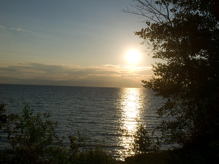 Sun Setting over Lake Winnipeg Photograph by Geoff Fierce - Fine Art ...