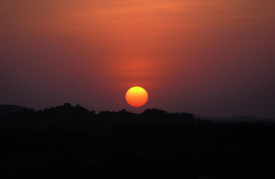 Mountain Photograph - Sun Setting Over Mountains In Hampi by Corey Rich