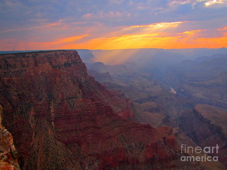 Landscape Photograph - Sunbeams Illuminating the Grand Canyon by John Malone
