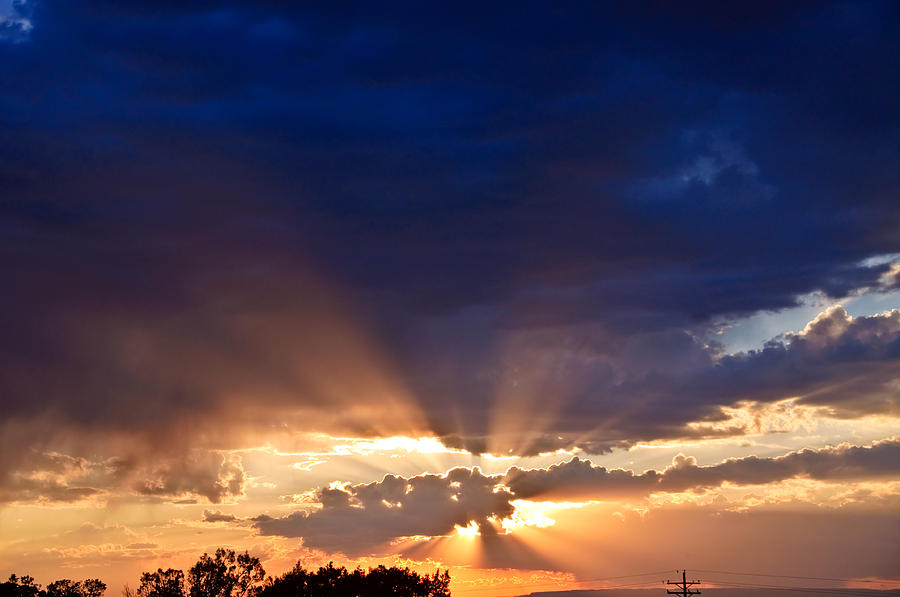 Sunbeams over Grand Mesa Photograph by Eric Rundle