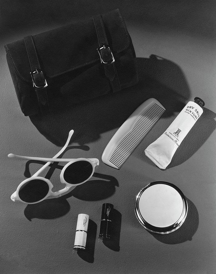 Sunglasses, Lipstick, And A Purse Photograph by John Rawlings
