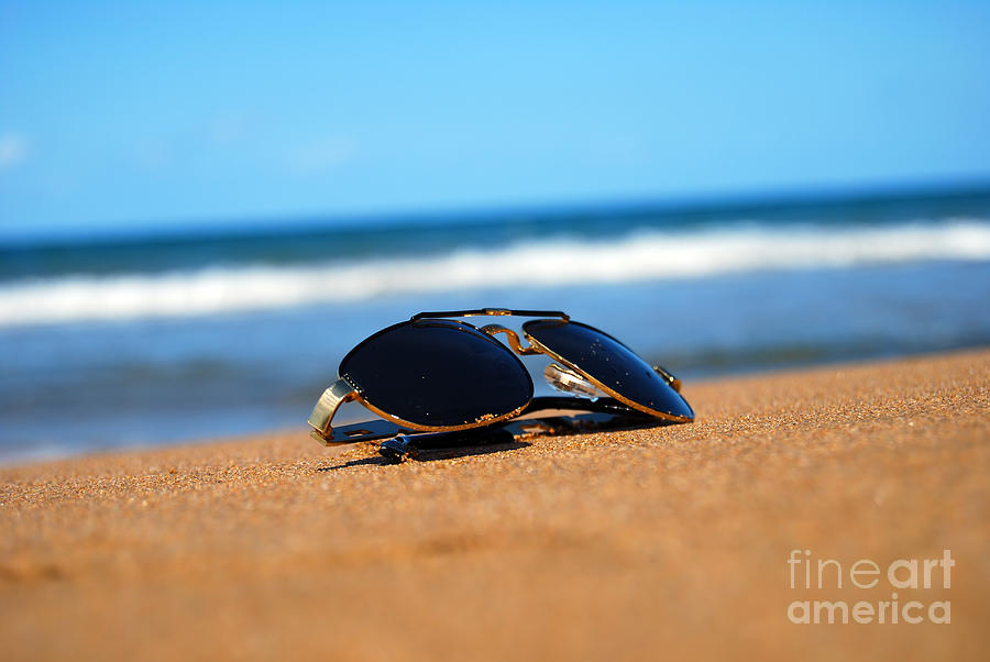 Sunglasses on beach Photograph by Antony McAulay