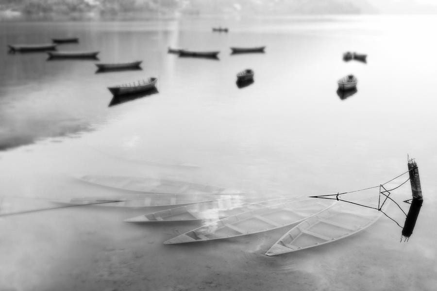 Sunken barques at Phewa Lake in Pokara Photograph by Dutourdumonde Photography