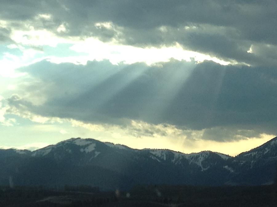 Sunrays through the Clouds Photograph by Shawn Hughes