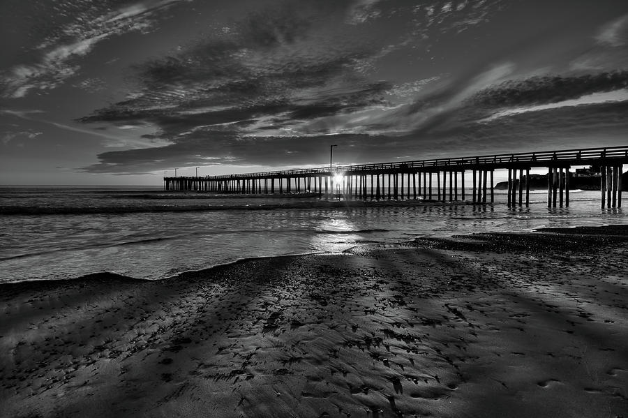 Sunset Photograph - Sunrays through the Pier in Black and White by Beth Sargent