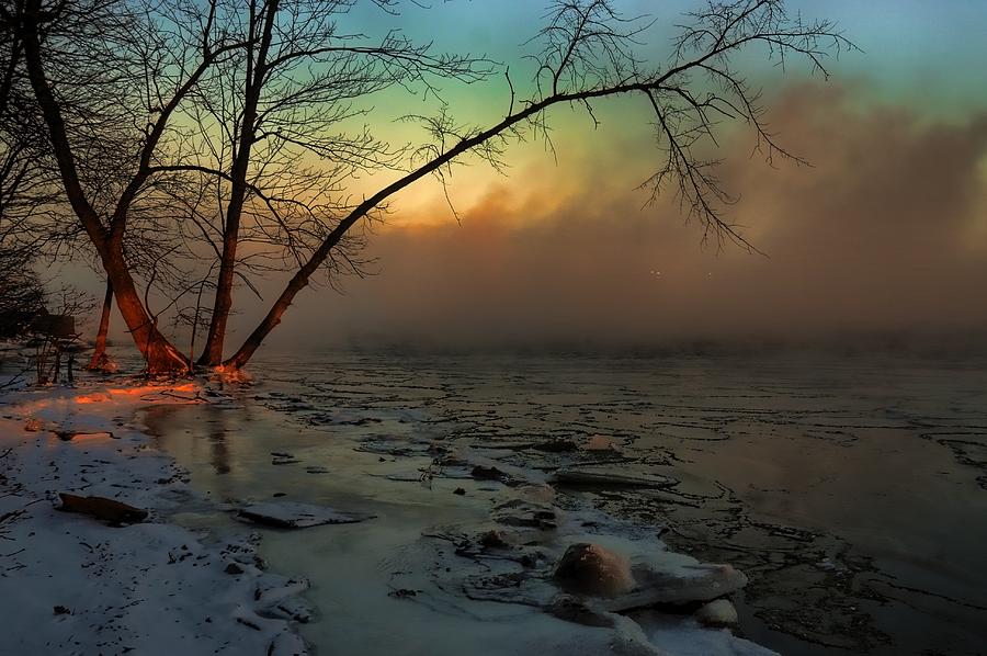 Sunrays warming up a frigid shoreline Photograph by Jana Kriz