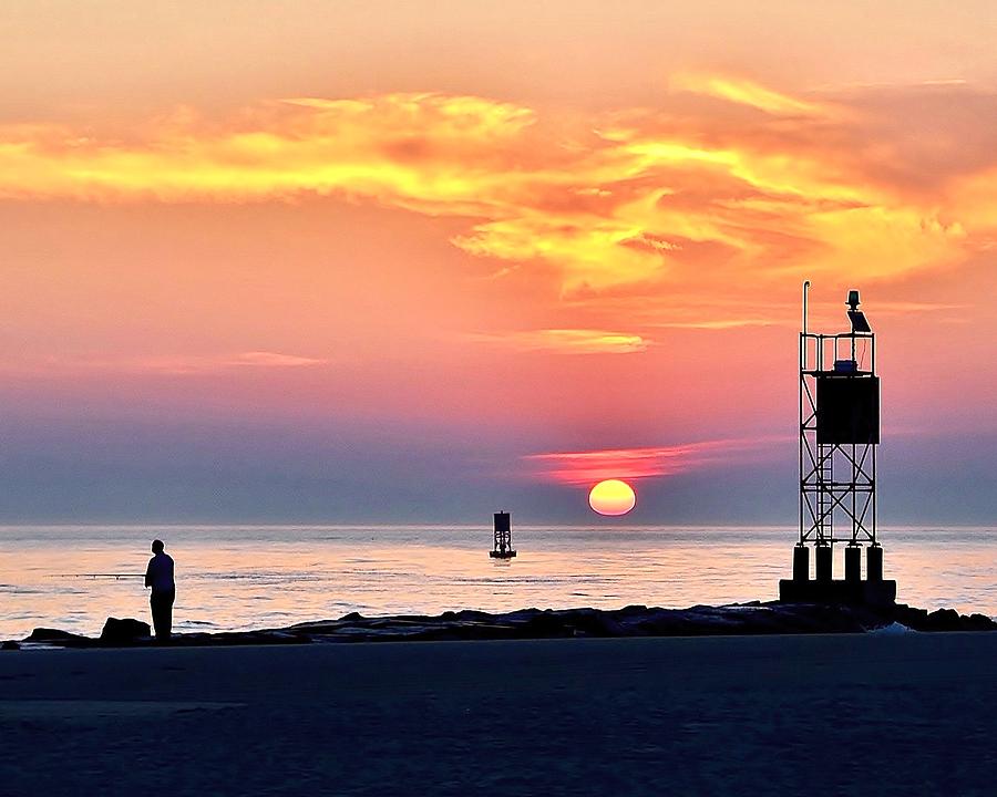 Sunrise at Indian River Inlet Photograph by Kim Bemis
