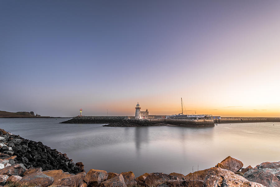 Sunrise at the Howth lighthouse Dublin Ireland Photograph by Giuseppe Milo