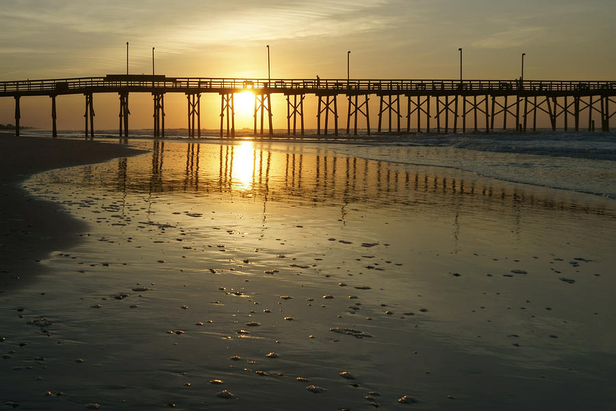 Sunrise at the Jolly Roger Pier Photograph by Mike McGlothlen