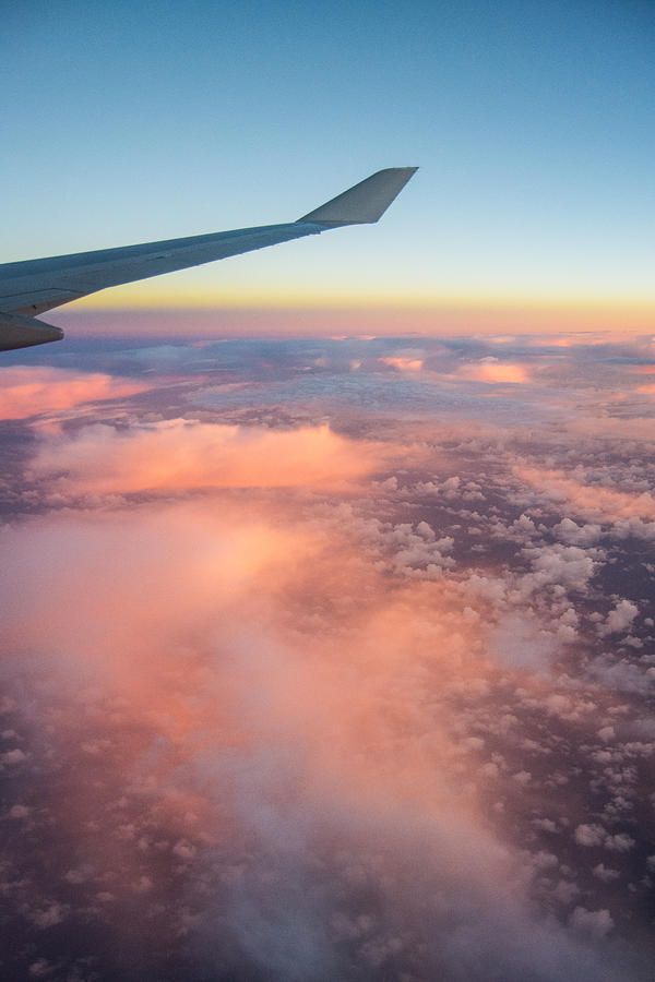 Airplane Photograph - Sunrise Clouds by Parker Cunningham