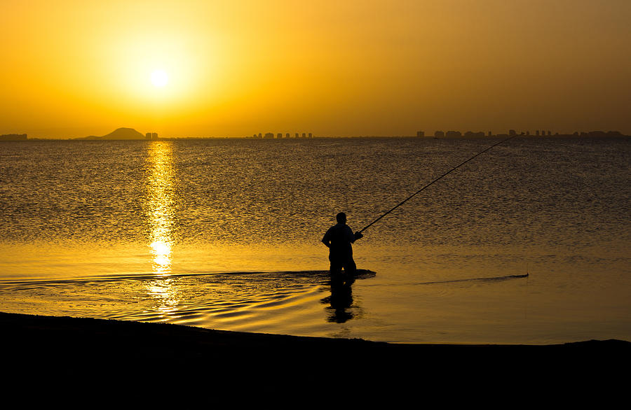 Sunrise fishing Photograph by Scott Carruthers
