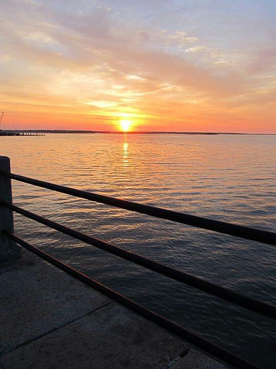 Sunrise on Charleston SC Battery Photograph by Joetta Beauford