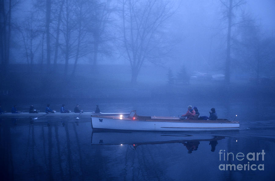 Sunrise on the Montlake Cut crew rowing on calm waters with coac Photograph by Jim Corwin