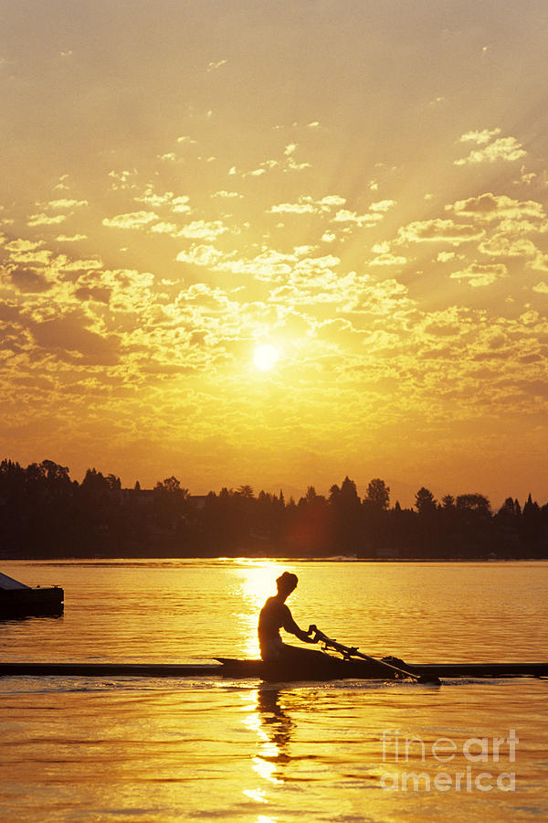 Spring Photograph - Sunrise on the Montlake Cut woman rowing on calm waters by Jim Corwin