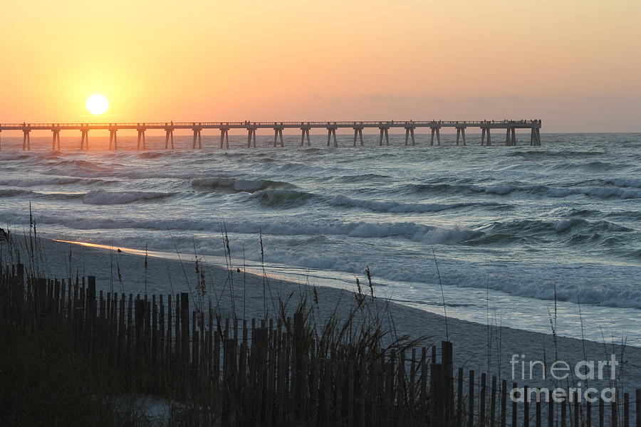 Sunrise on the pier Photograph by Michelle Powell