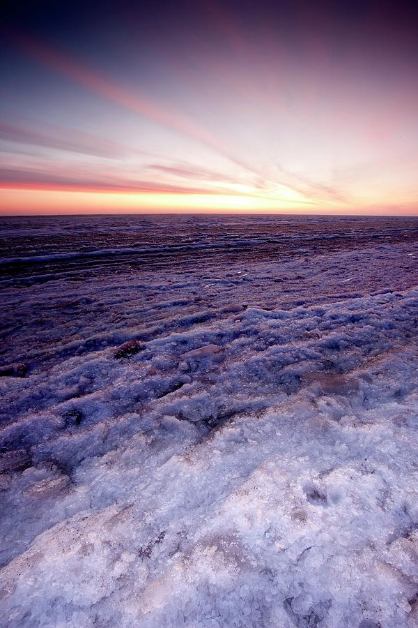 Sunrise Over A Frozen Beaufort Sea Photograph by Chris Madeley