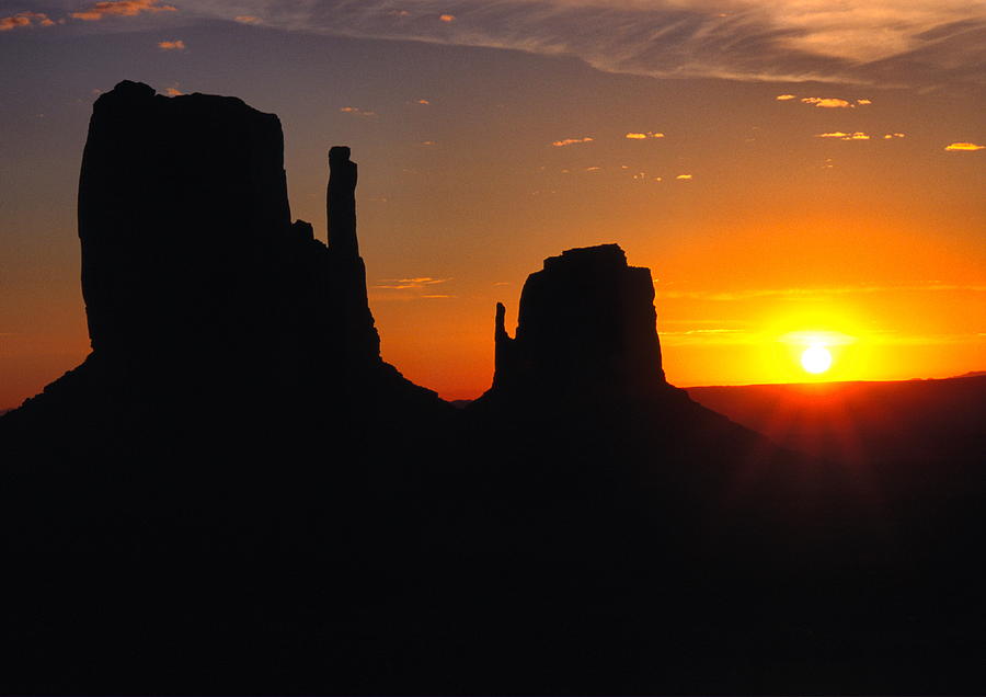 Sunrise over The Mittens in Monument Valley Photograph by Gary Corbett