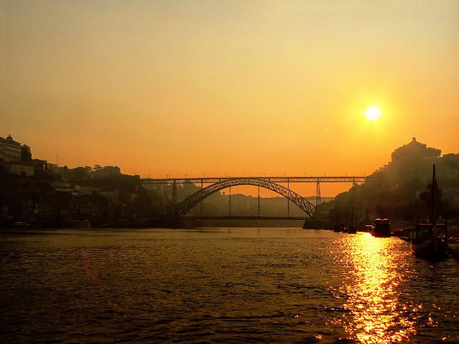 Sunrise over the river Photograph by Paulo Goncalves