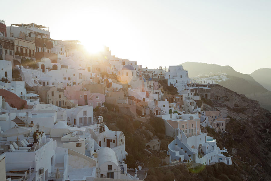 Sunrise Over The White Buildings In The Photograph by Matteo Colombo