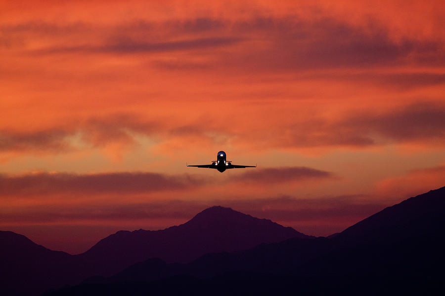 Sunrise Takeoff Photograph by John Daly