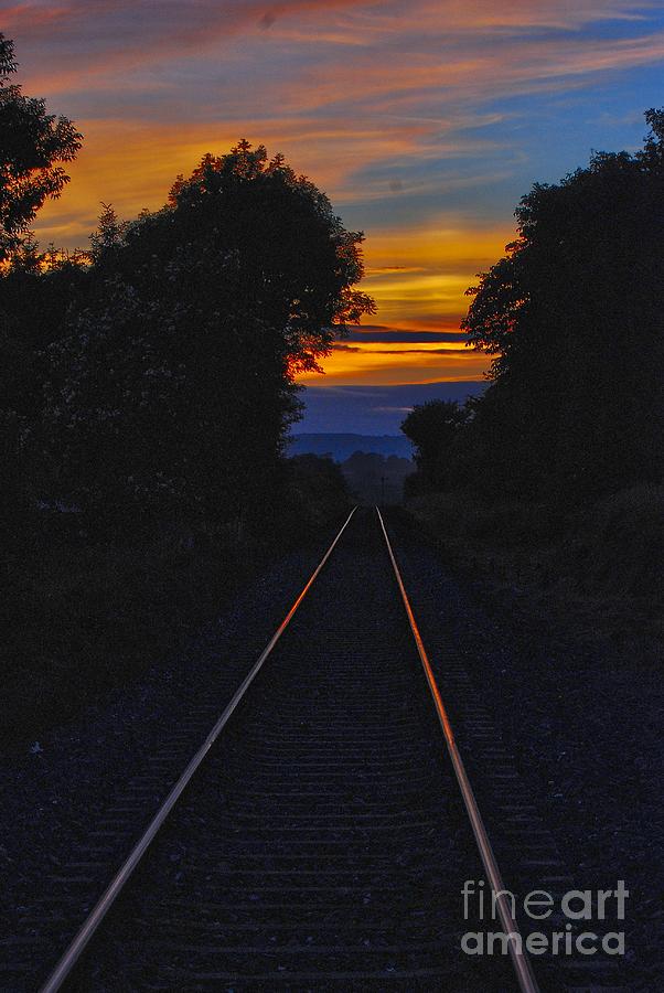 Sunset along the tracks Photograph by Joe Cashin