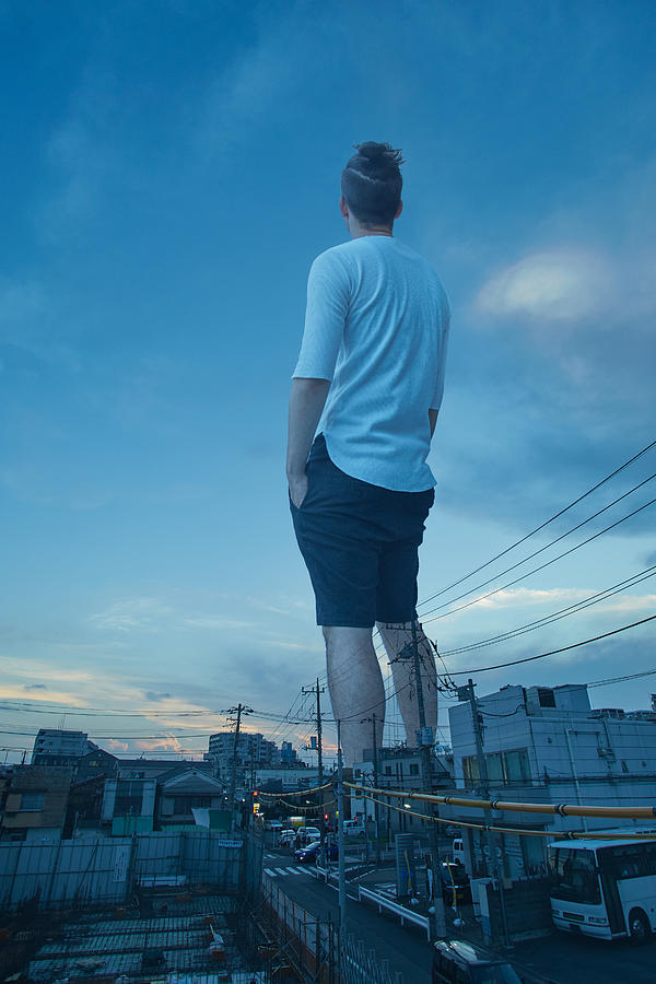 Sunset and the giant Photograph by Yuji Karaki