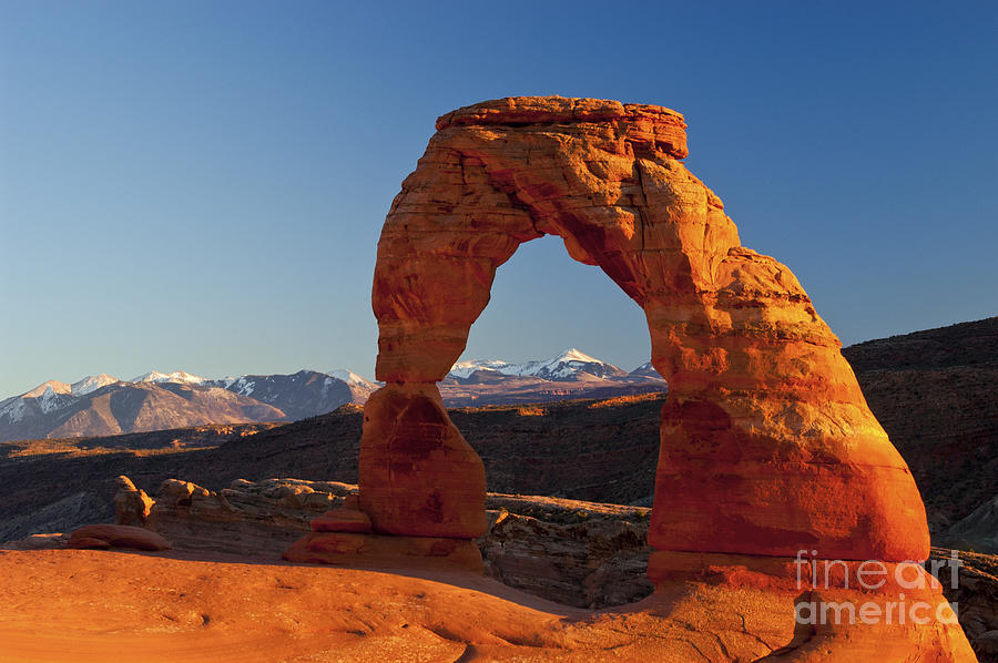 Sunset at Delicate Arch One Photograph by Bob Phillips