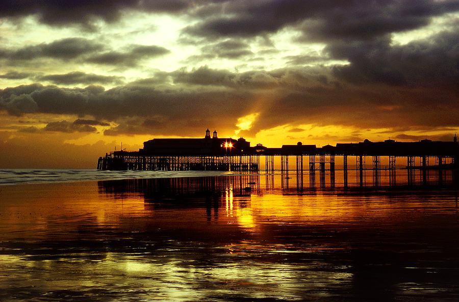 Sunset at Hastings Pier UK Photograph by Maggie Mccall