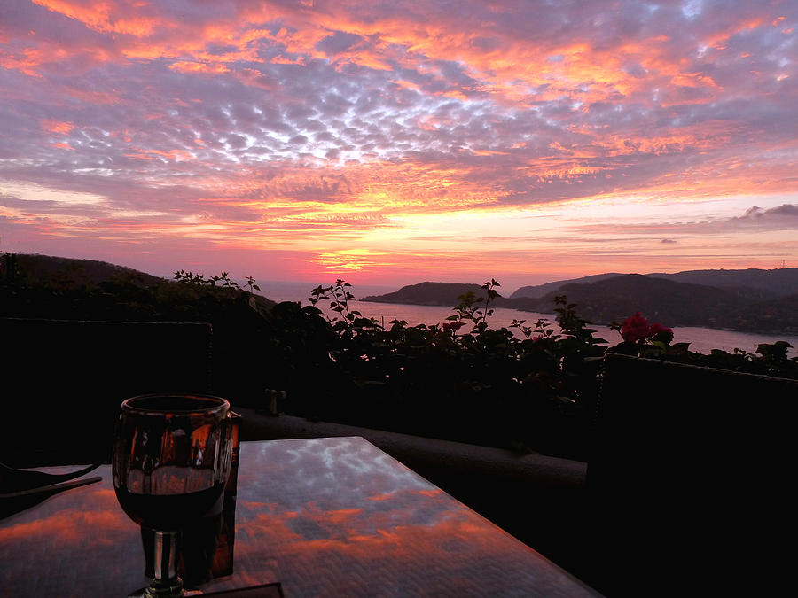 Sunset over Zihuatanejo Bay Photograph by Rosanne Licciardi