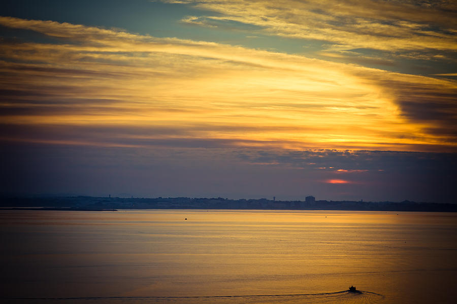 Sunset at Lagos Portugal Photograph by Raimond Klavins
