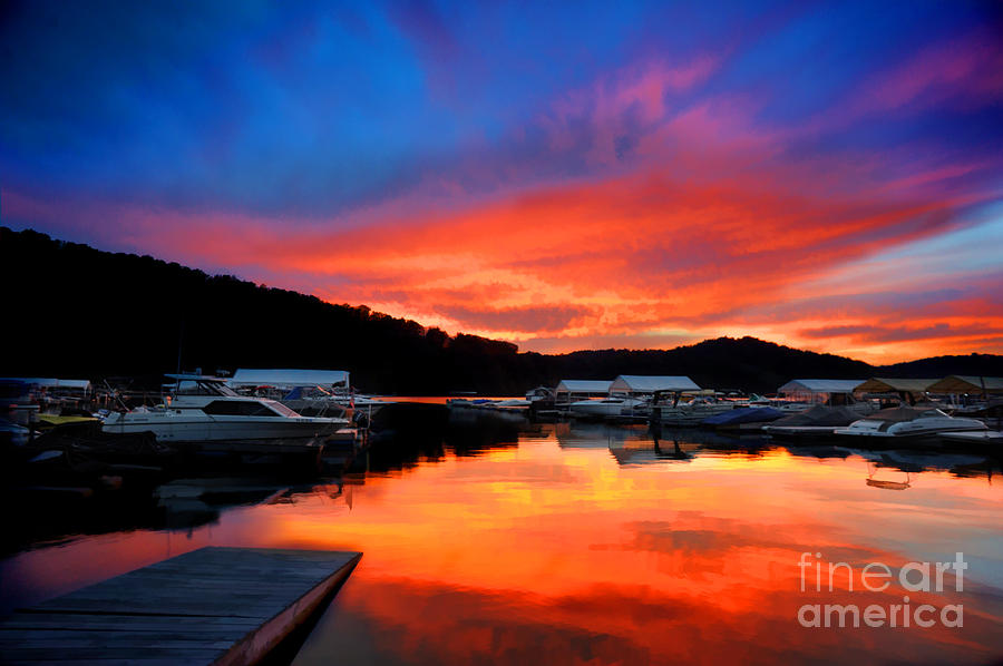 Sunset at marina on lake Photograph by Dan Friend