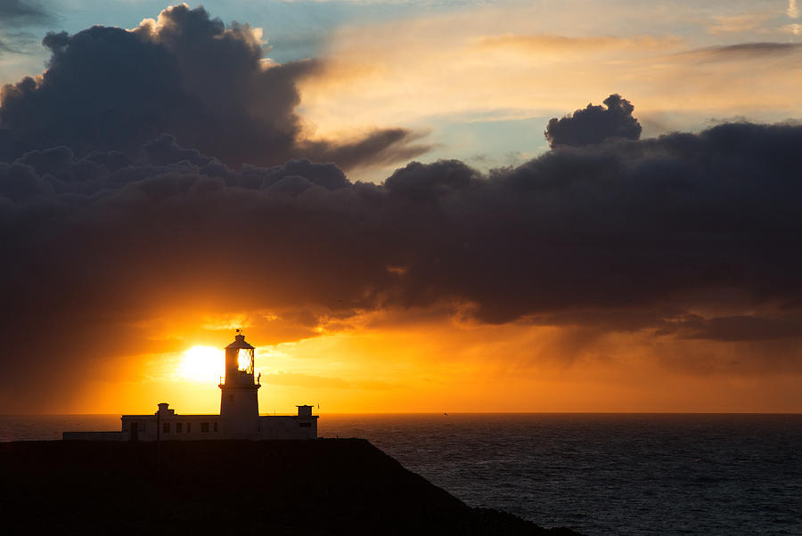 Sunset at Strumble Head Lighthouse Photograph by Ian Middleton