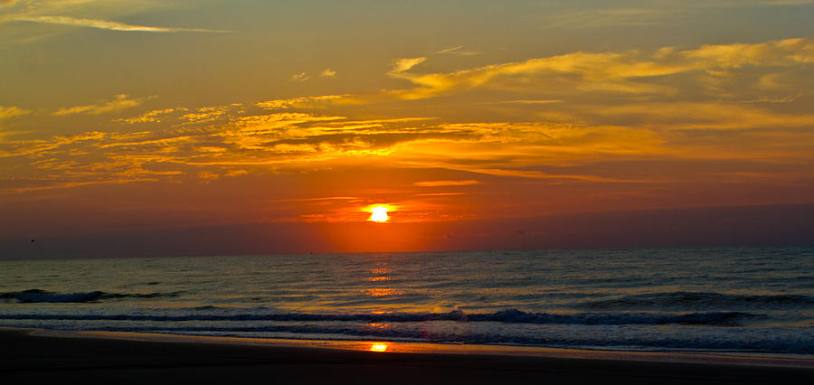 Sunset at the beach Photograph by Jonny D