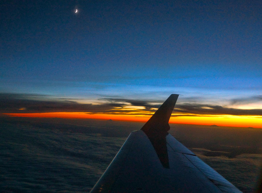 Sunset at thirty thousand Feet Photograph by Ron Roberts