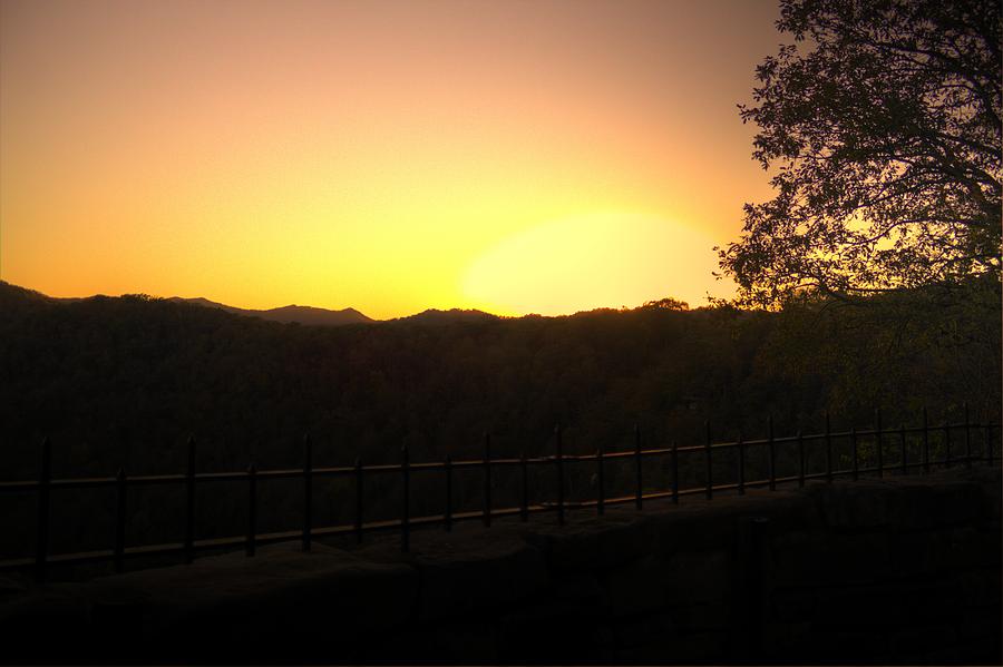 Sunset behind hills Photograph by Jonny D