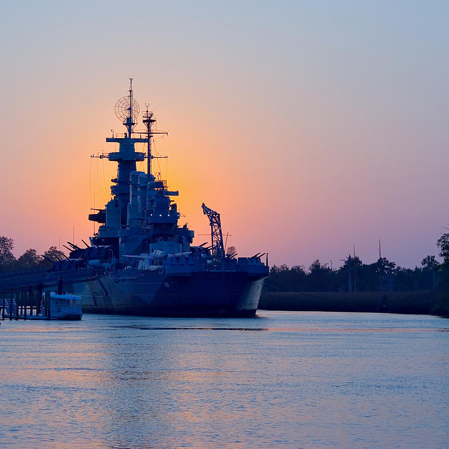 Sunset behind USS North Carolina Photograph by Red_moon_rise