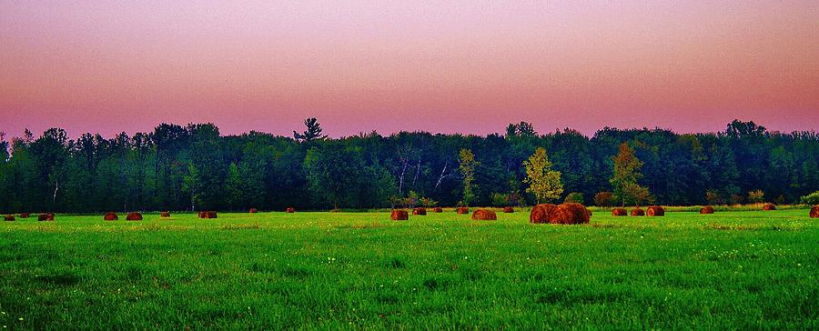 Sunset Hay rolls 1 Photograph by Daniel Thompson