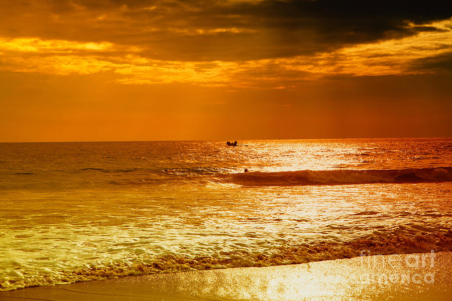 sunset in gold and red at the Hikkaduwa beach Photograph by Gina Koch