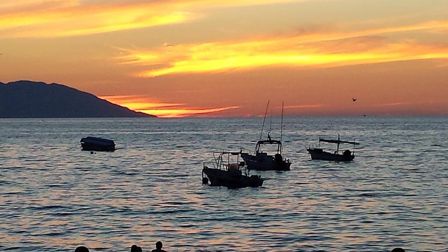 Sunset in Puerto Vallarta Photograph by Nimmi Solomon - Pixels