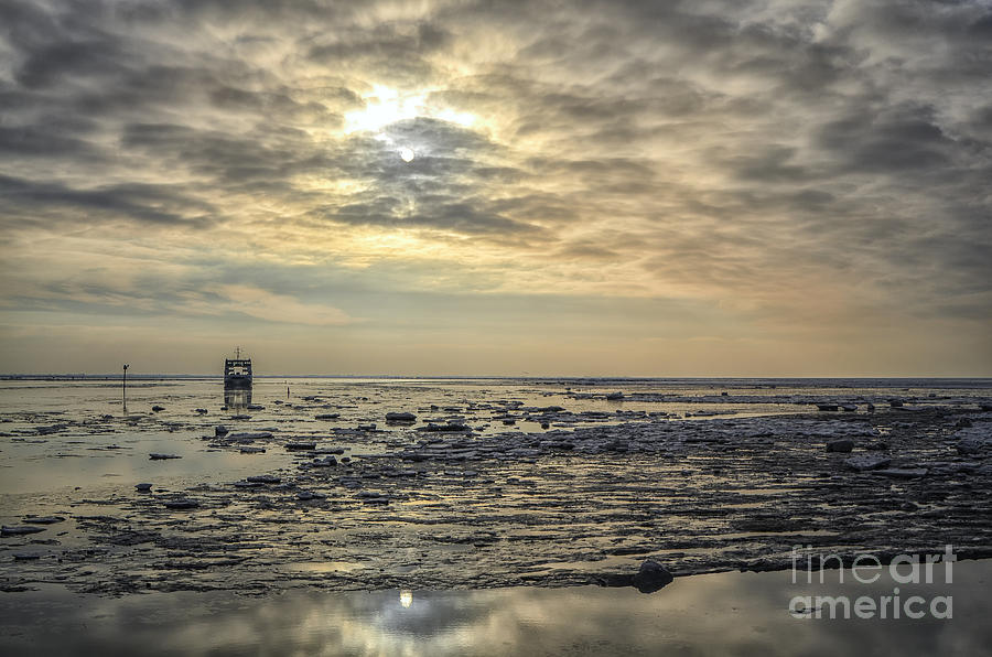 Sunset on a wadden sea with ice Photograph by Patricia Hofmeester