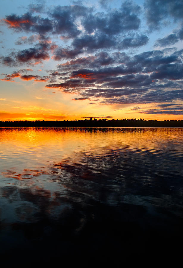 Sunset on Black Lake near Perth Ontario. Photograph by Rob Huntley